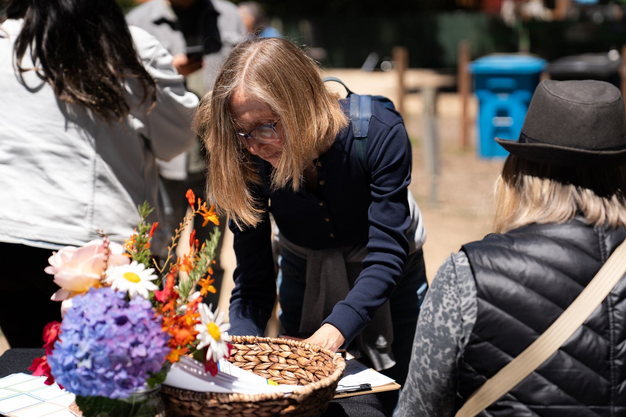 Volunteer at the welcome table